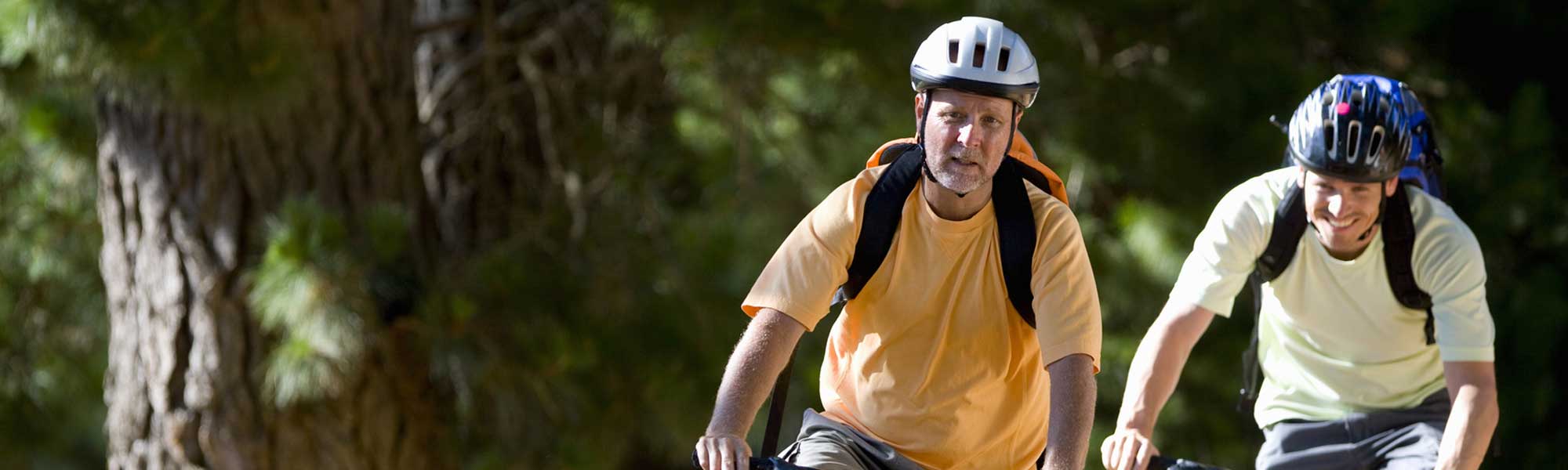 Men Riding Bikes